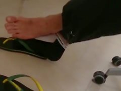 Alla messaggistica unificata di Amigo Filmando di seu parceiro di di Havaianas it Meias .