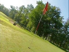 Verschiedenfarbig Flotter Dreier Flotter auf dem Golfplatz