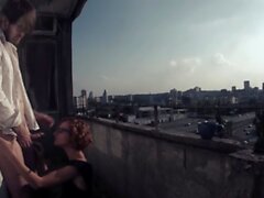 Redhead has her morning coffee and sex on the balcony