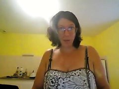 Mature toying herself on webcam