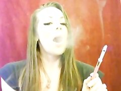 Layla smoking all white in holder whit sexy dangles