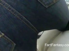 girl in jeans farting