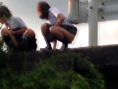 Teens in uniform pissing